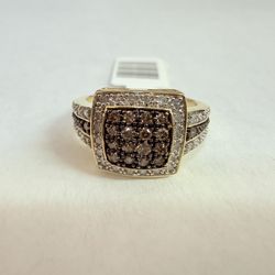 One 10KT yellow gold 0.44 cttw. pavé set champagne & white diamond ring
