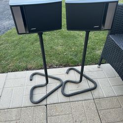 2 Bose speakers with stands