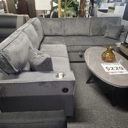 Brand new gray corduroy sectional with sofa sleeper and storage chaise (90"x90"×36"H)