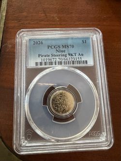 1 gram gold (9kt) coin - pirate coin - NIUE 2026 $1 Pirate Steering - PCGS MS70