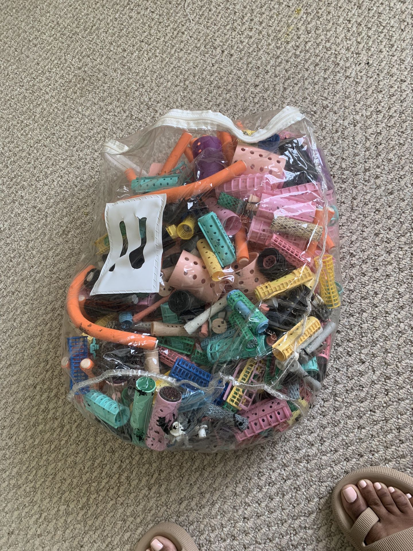Bag of Used Rollers And Curlers