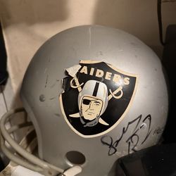 Raiders helmet signed by someone