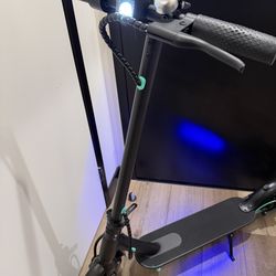 Artudatech Foldable Electric Scooter - Colorful LED Lights & Dual Brakes
