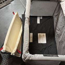 Pack and play with padding