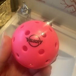 Pickle Balls in festive colors; 50+ balls.  Decorate or exercise - or both!!