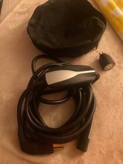 TESLA CHARGER GEN 2 WITH CASE…make an offer