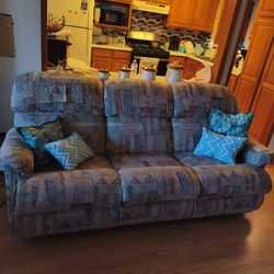Couch with two recliners on each end good shape