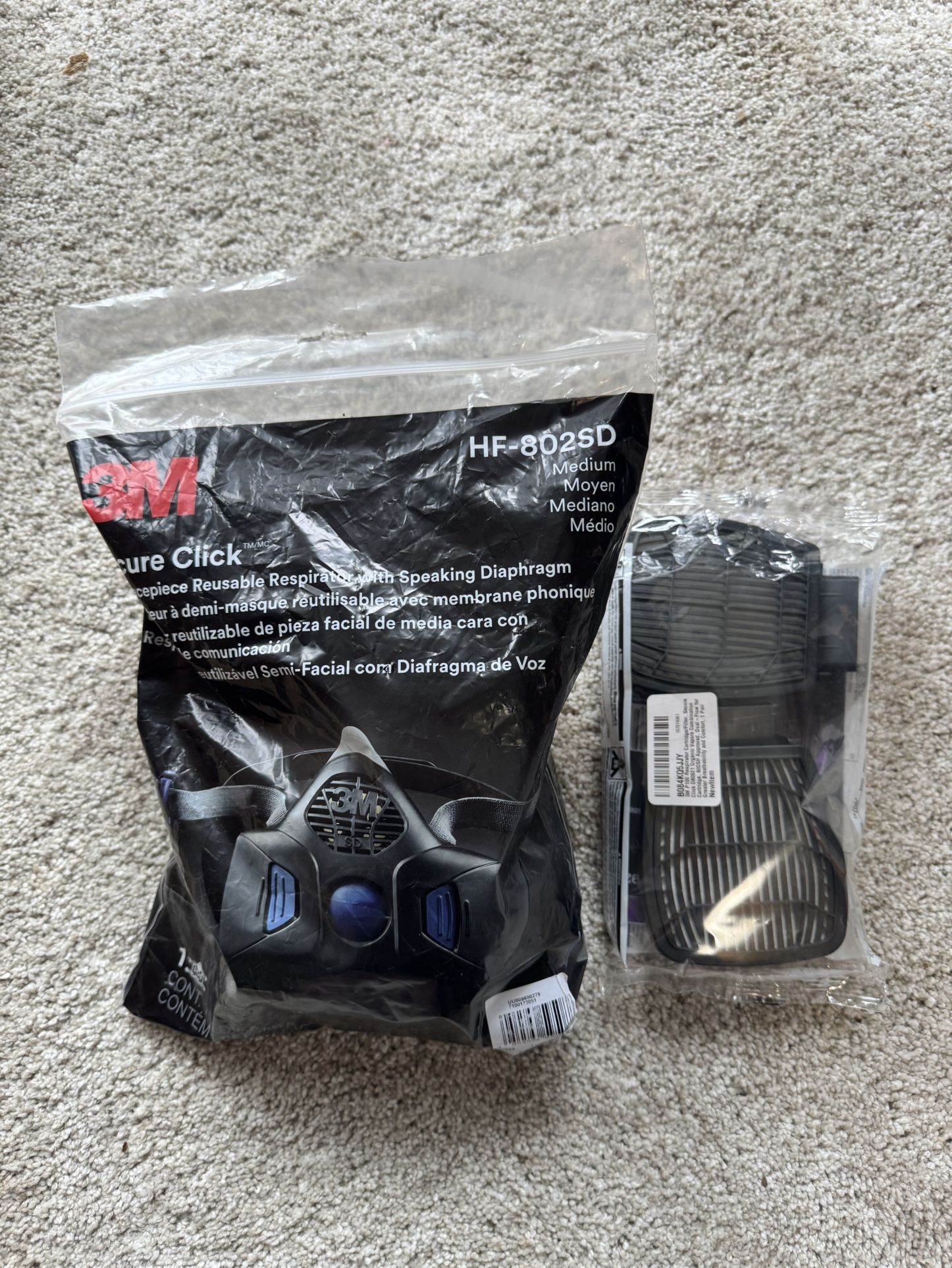 New, never used 3M Reusable Respirator with Speaking Diaphragm and 3M P100 Respirator Cartridge/Filter, Secure Click D80921