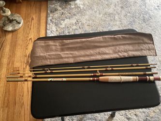 7’9” Ted Williams fly fishing rod model number 535–305 with original fabric sleeve it’s it’s an antique that was never used