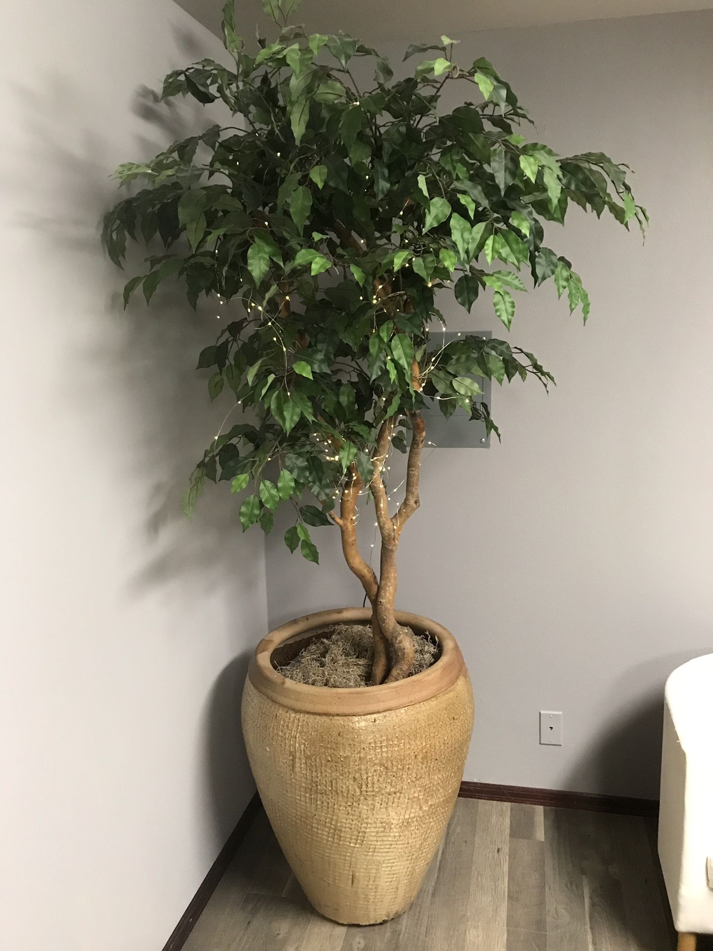 Large planter with fake plant