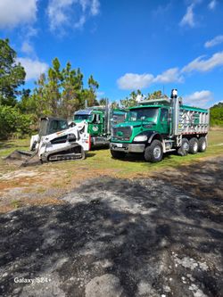 Fill dirt and Bobcat
