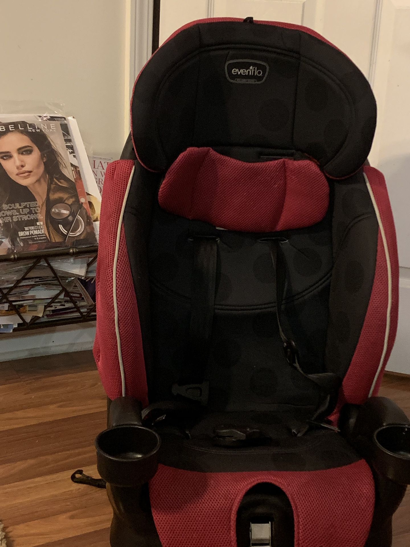 Pink and black evenflo car seat
