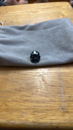 This is a LEGO Star Wars TIE Fighter Pilot Minifigure Helmet.