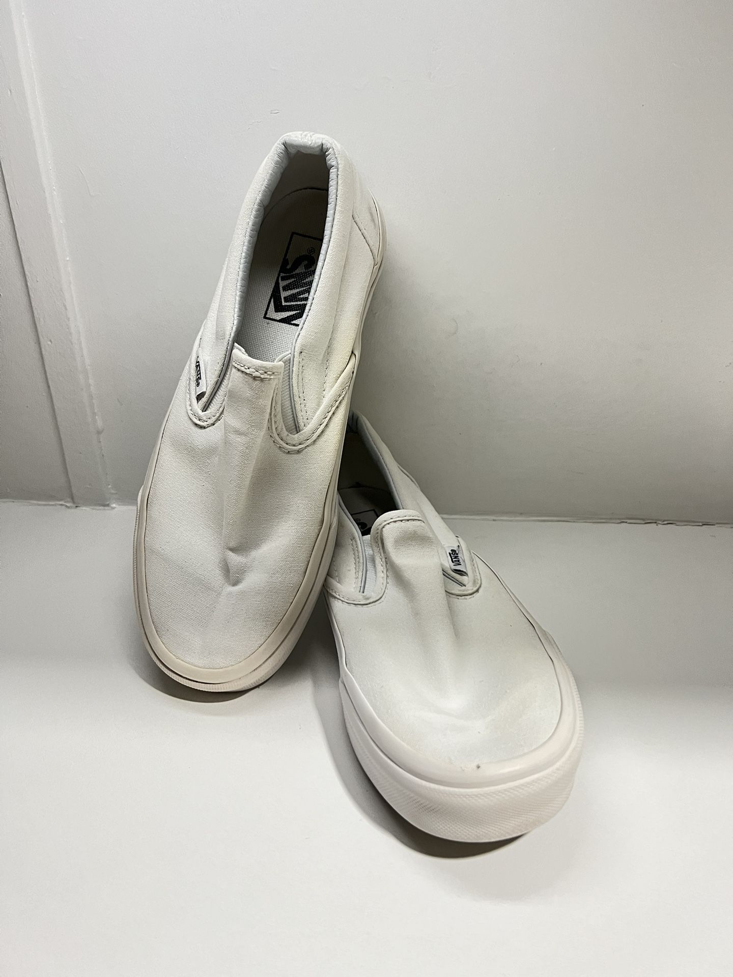 Vans white slip ons shoes Mens 6 women 7.5