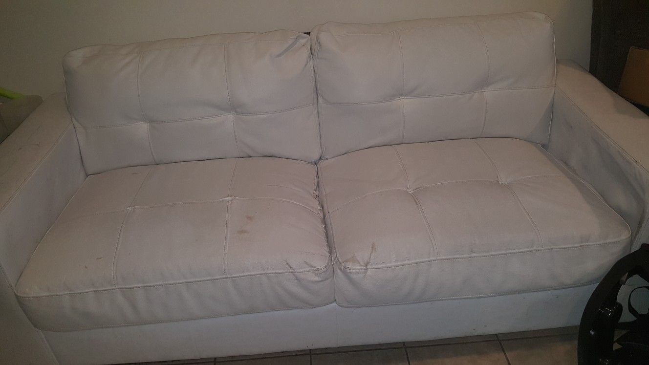 White leather couch.