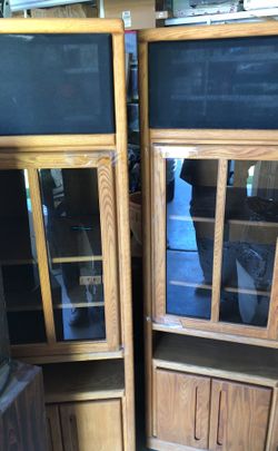 A 6 foot high 7 1/2 feet long oak entertainment center.