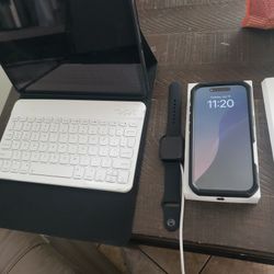 10 inch ipad with keyboard apple watch and  IPhone 16 pro 