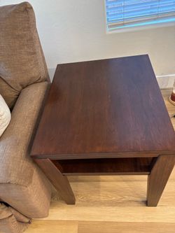Two matching end tables made of solid wood and are quite sturdy