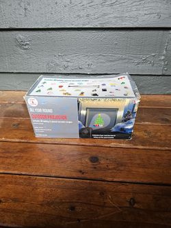 All Year Round Holiday Outdoor PROJECTOR Trim a Home