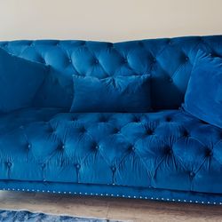 Blue velvet tufted Chesterfield sofa  with nailhead trim