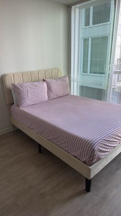 Beige Upholstered Bed Frame with Tufted Headboard