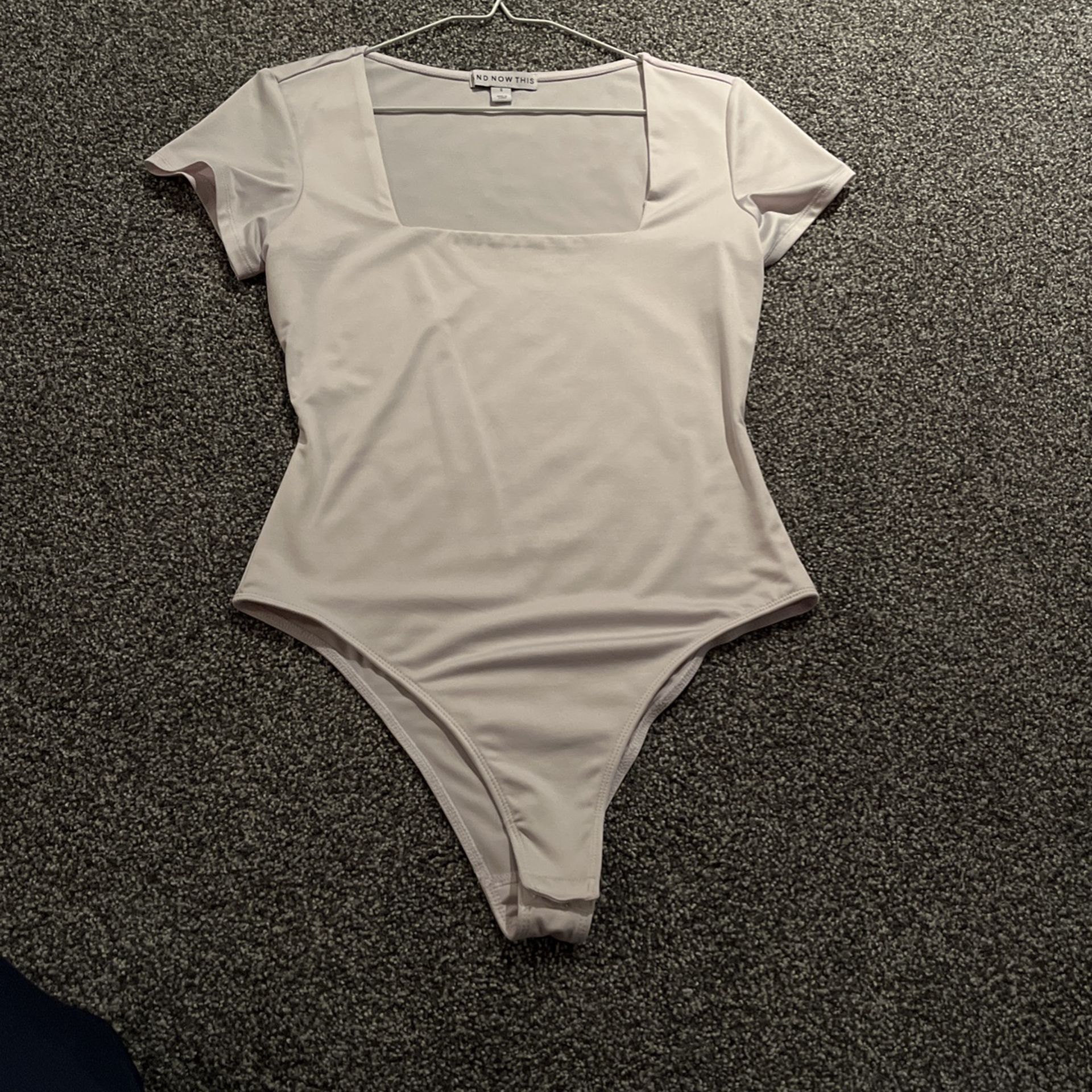 And Now This White Bodysuit