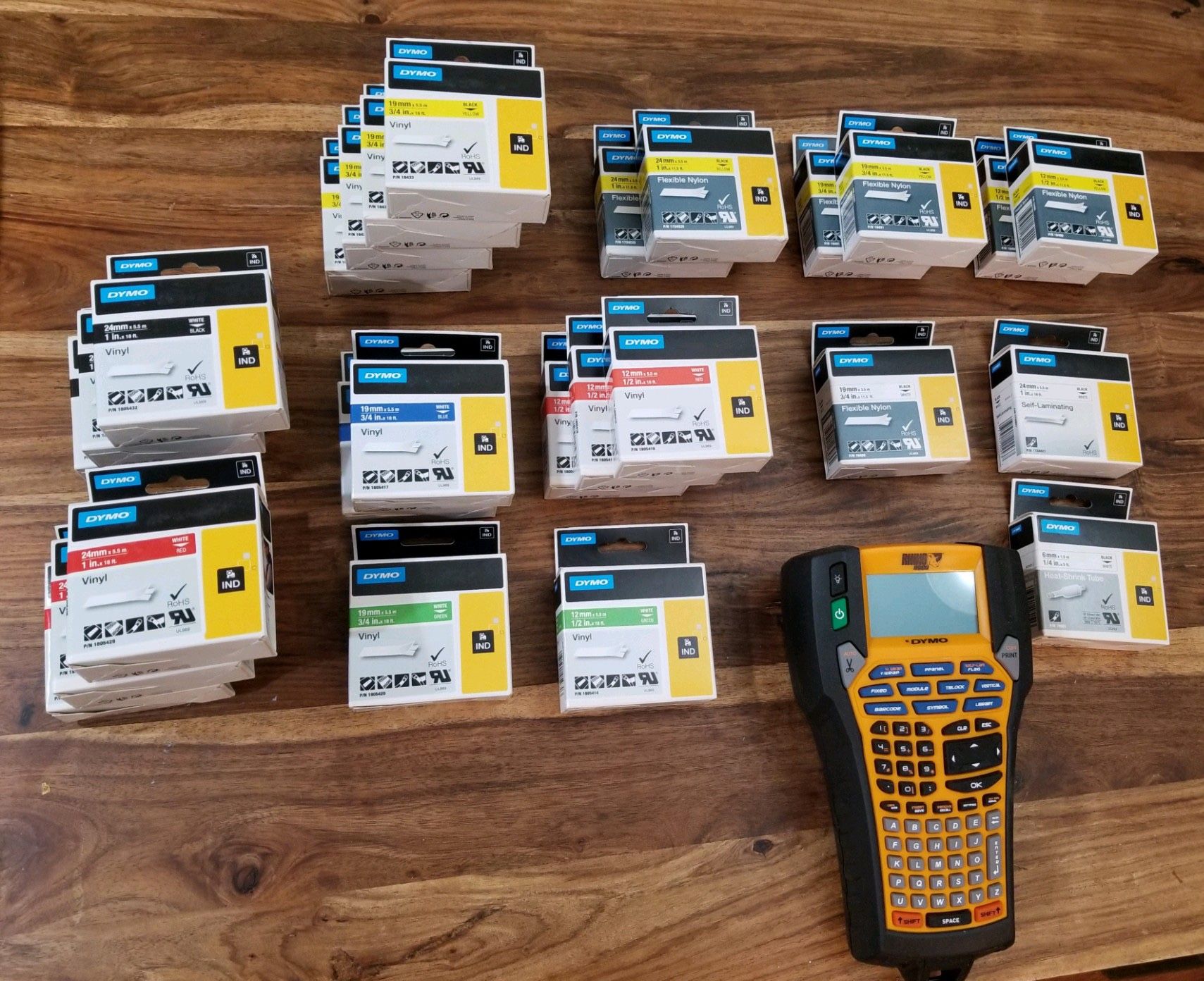 DYMO RHINO 6000 THERMAL LABEL PRINTER AND 26 DYMO RHINO TAPES. 