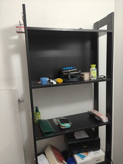 Tall black bookshelf / storage shelf in New condition.