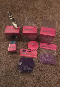 Quince / quinceañera decor items. Balloons, clear and slipper ribbon ,teal dolls, and purple table crystals