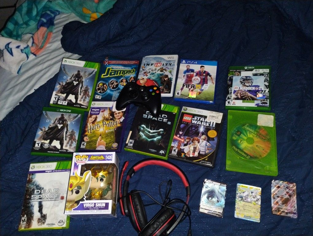 A Bunch Of Games, A Funko Pop, An Xbox 360 Controller, A Headset, And 3 Pokemon Cards.