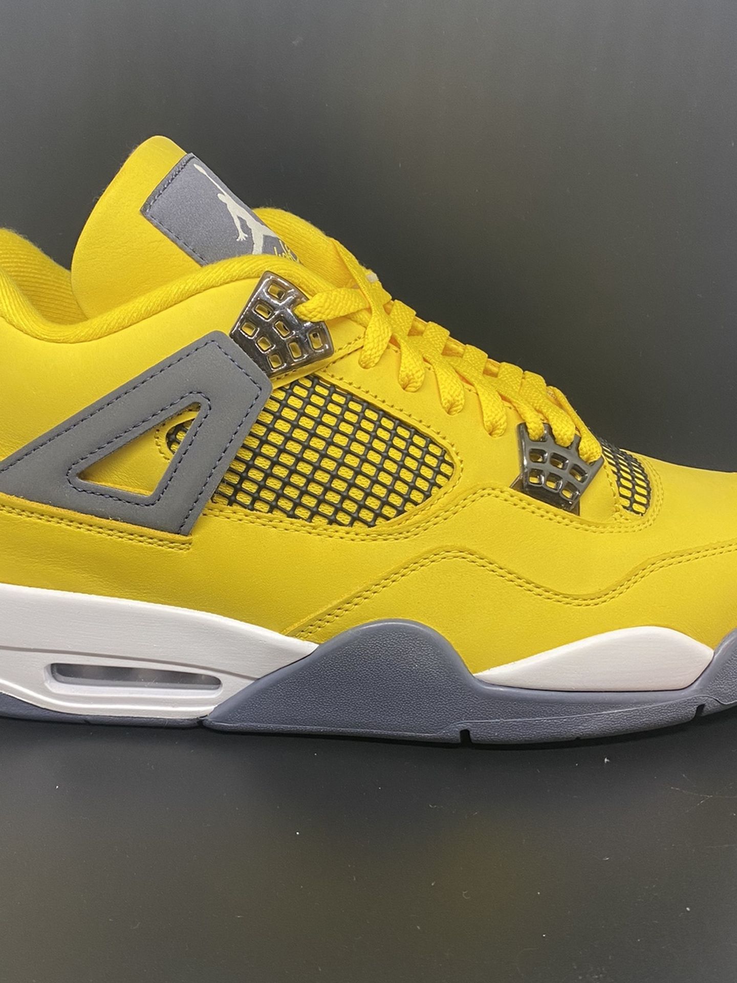 Jordan 4 Retro “Lightning”