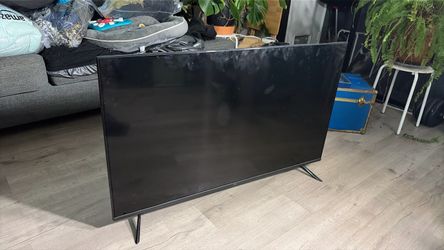 Large Flat Screen TV with Stand