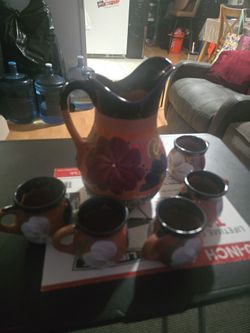 Clay pitcher w 5 mugs
