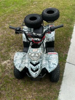 Tao kids 4 wheeler &  (2 new tires)