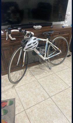 Jamis Ventura Sport road bike with helmet and accessories