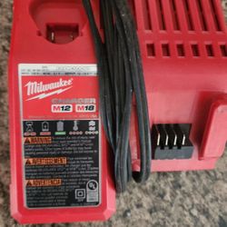 Milwaukee M18 Red Lithium Battery And Charger