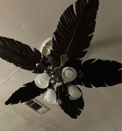 Beautiful palm frond room fan