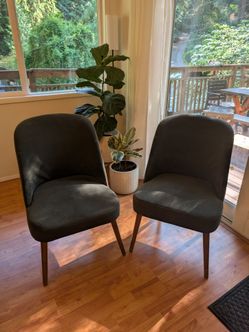 2 World Market Codie green upholstered dining chairs