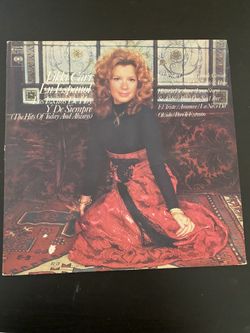 Nat King Cole and Vikki Carr vinyl records
