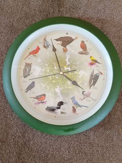 Wings of a feather flock together clock