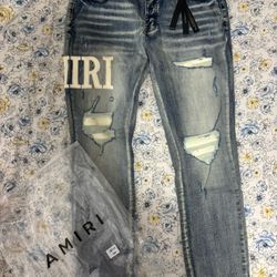 Blue/white Amiri Jeans.