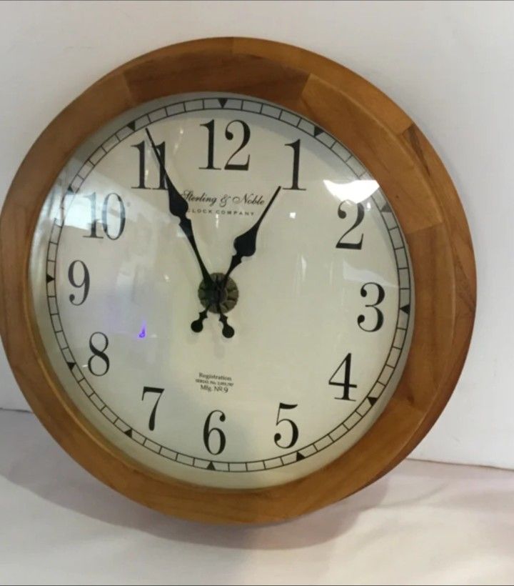 Sterling & Noble clock company, retro wall clock trimmed, in walnut