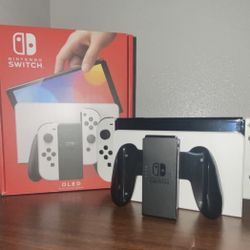 Nintendo Switch OLED 64GB With Games Mariokart8 Deluxe and Marvel Superheroes 2