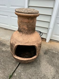 Chiminea with stand and folding grate
