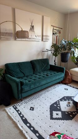 Emerald green velvet couch