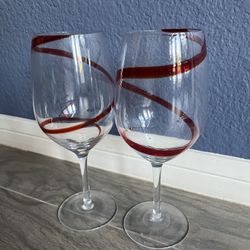 Red swirl wine glasses ( Make Offer)