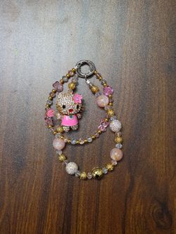 Pink Hello Kitty holding Lollipop Bag Chain