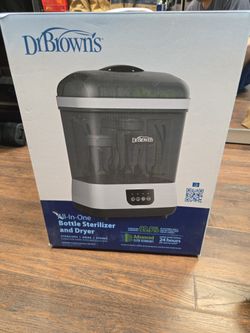 Dr. Brown's Clean Steam Bottle Sterilizer and Dryer, which is a 4-in-1 device that sterilizes, dries, and stores baby bottles.