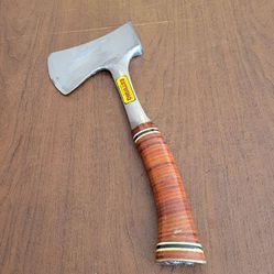Vintage Estwing Leather Wrap Sportsman Axe Hatchet w Leather Sheath . 
Pre-owned, good shape, please see photos for details. Axe made in USA. 
