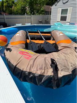 Inflatable raft and motor